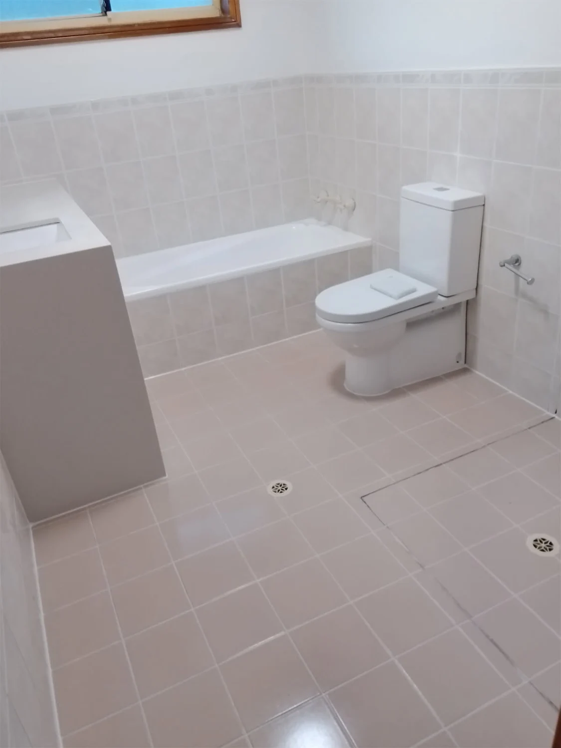 Pink bathroom tile restoration